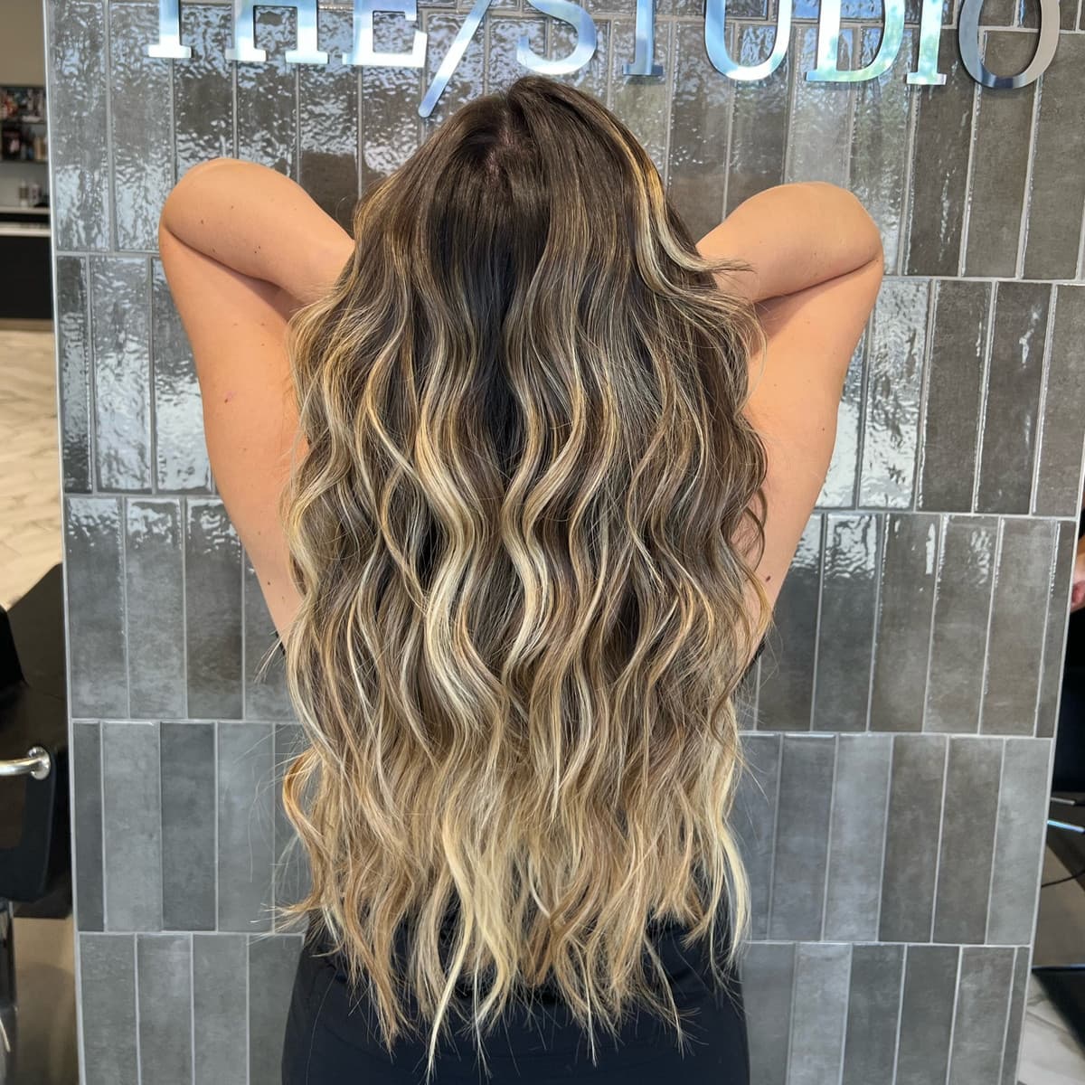 Long dimensional blonde waves colored by Courtney Morgan